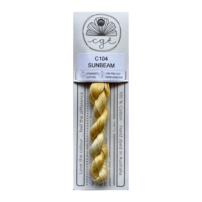 Packaged embroidery thread with a label indicating 'Sunbeam' color on a white background