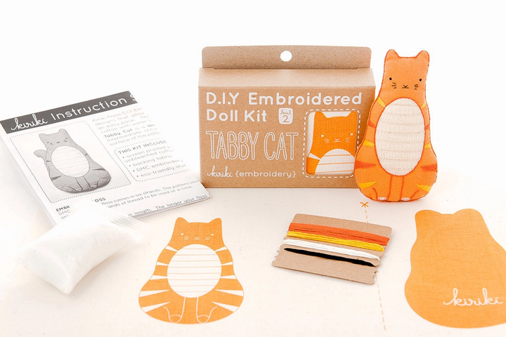 DIY Embroidered Doll Kit with tabby cat design on a white background