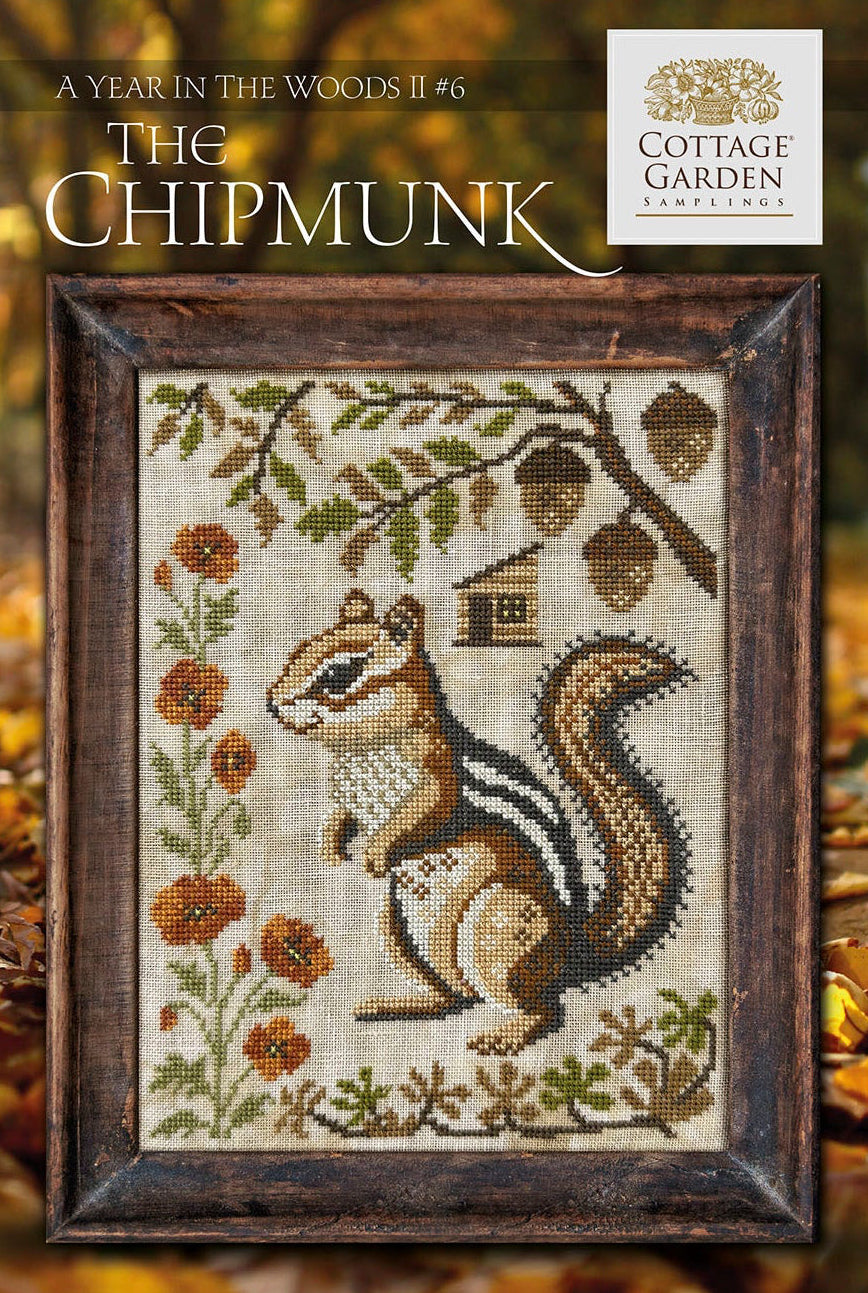 Cottage Garden cross-stitch pattern featuring a chipmunk with autumn-themed elements.