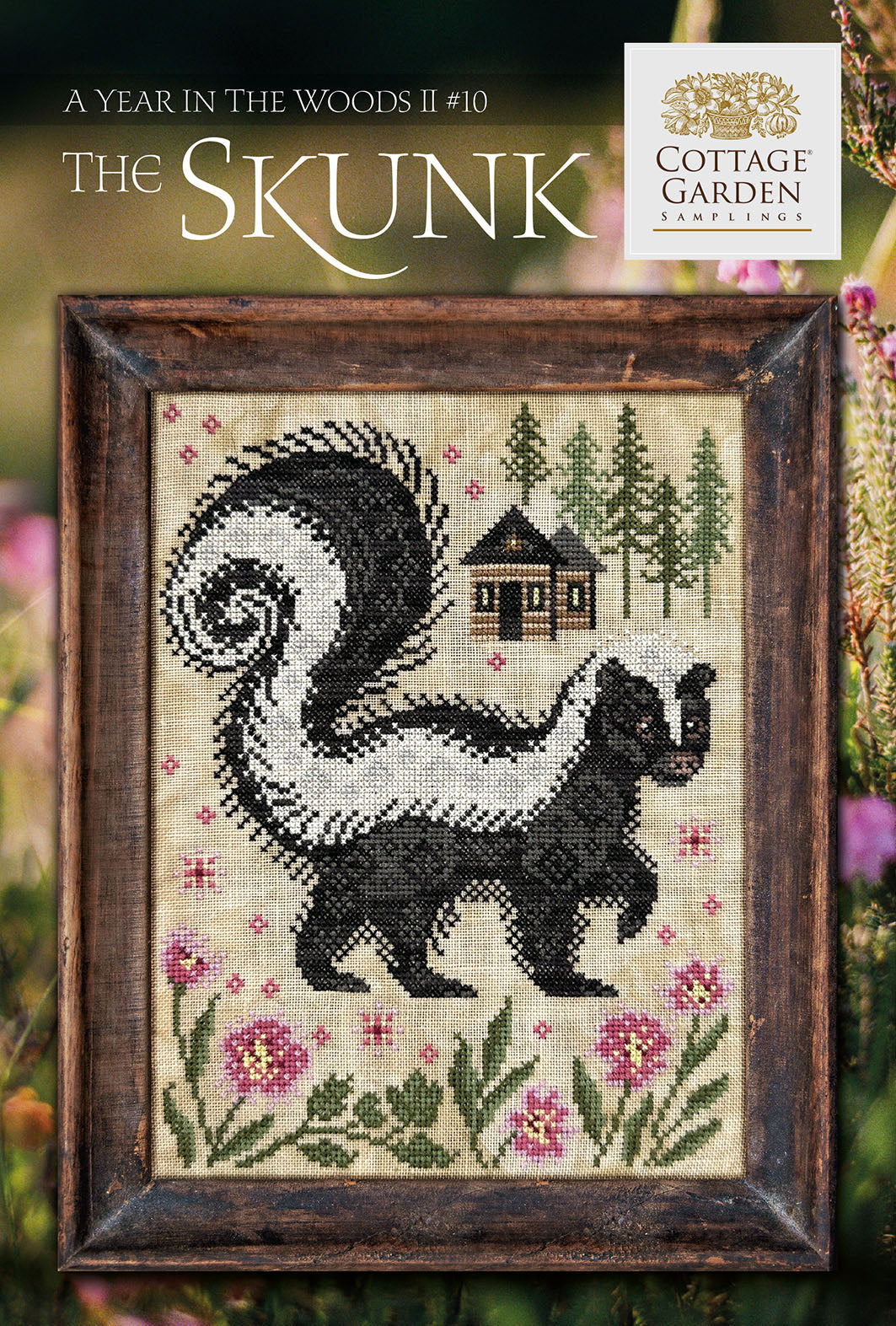 Cross-stitched skunk design with a wooden frame, featuring the Cottage Garden Company logo.