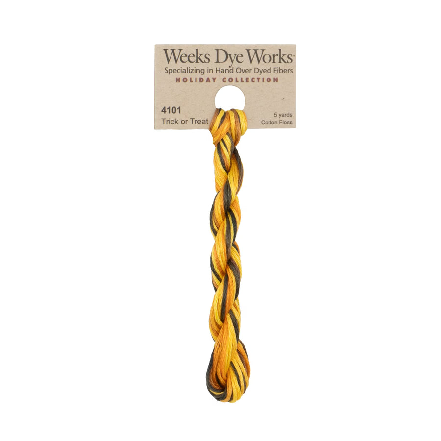 A single twisted cotton cord in a mustard yellow and black striped pattern, attached to a paper header card that reads 'Weeks Dye Works Holiday Collection 4101 Trick or Treat.' on a plain white background.