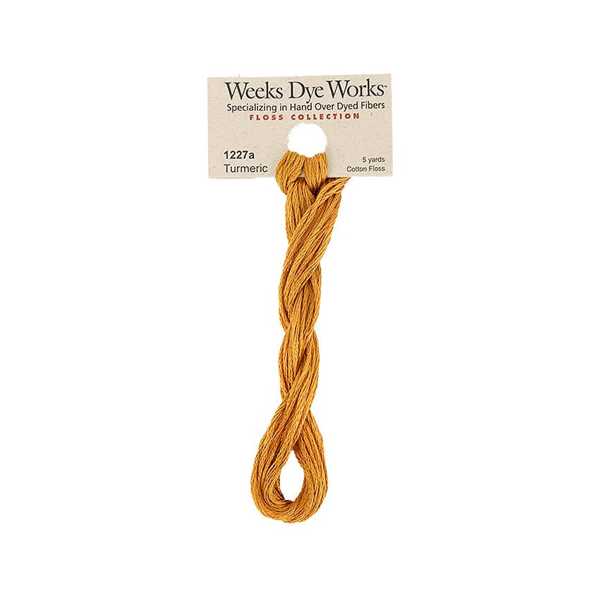 Yellow thread skein with Weeks Dye Works label on a white background