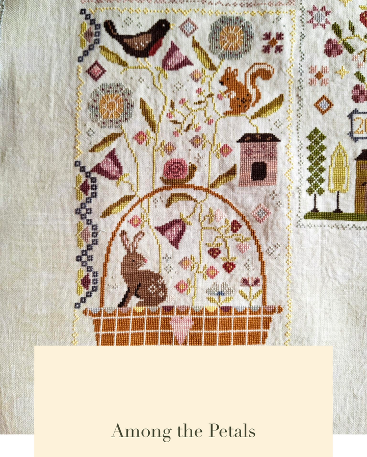 Embroidery pattern with animals and flowers on a textured fabric background, featuring the text 'Among the Petals'.