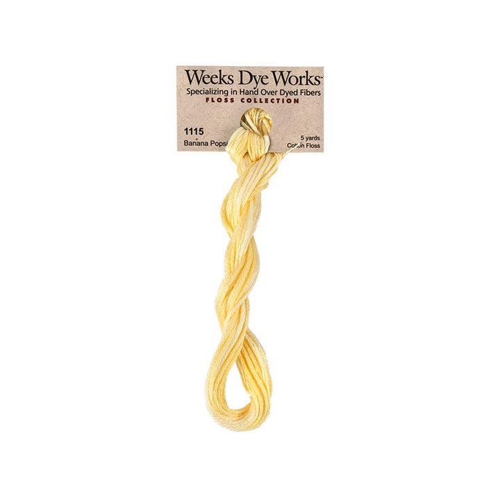Yellow thread skein with Weeks Dye Works label on a white background