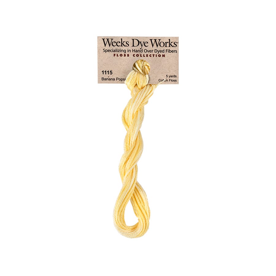Yellow thread skein with Weeks Dye Works label on a white background
