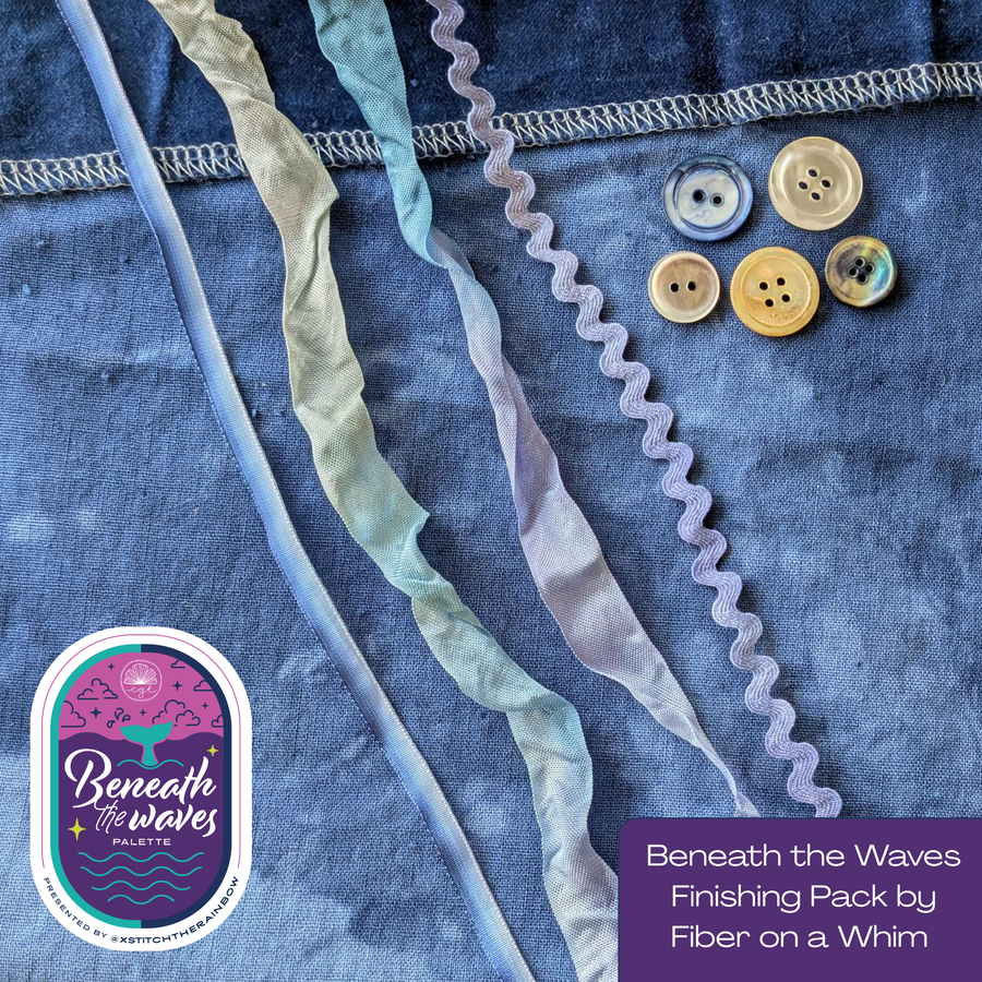Textile with ribbons and buttons on denim fabric, featuring 'Beneath the Waves' palette by Fiber on a Whim.