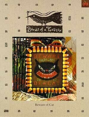 Decorative Halloween sign with corn and cat design on a textured beige background