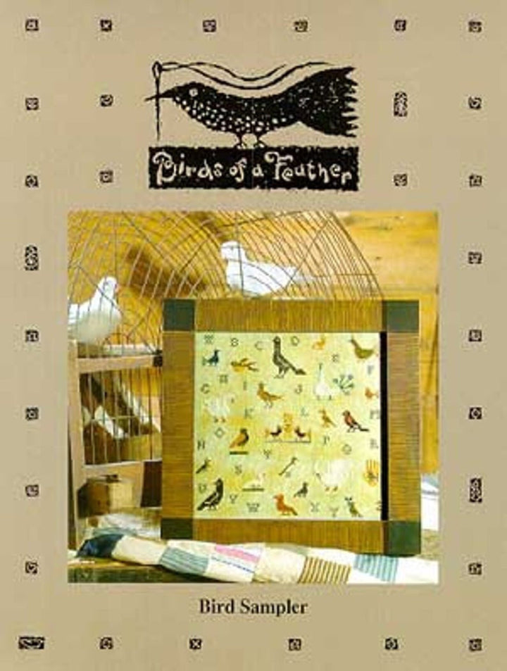Quilt with bird designs on a beige background, featuring the text 'Birds of a Feather'.