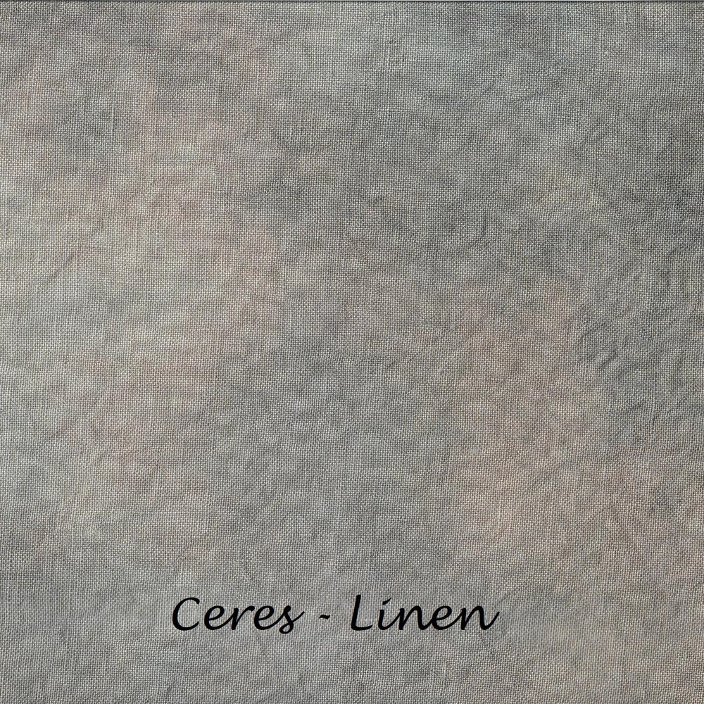 A textured fabric swatch with a mottled gray and beige linen-like pattern, labeled 'Ceres - Linen' at the bottom.