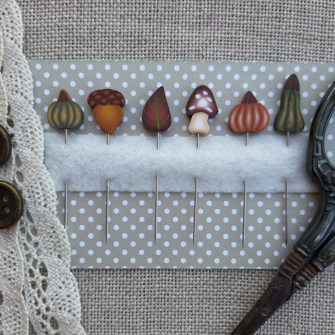 set of handmade ipns featurng pumpkins leaves and acorns 