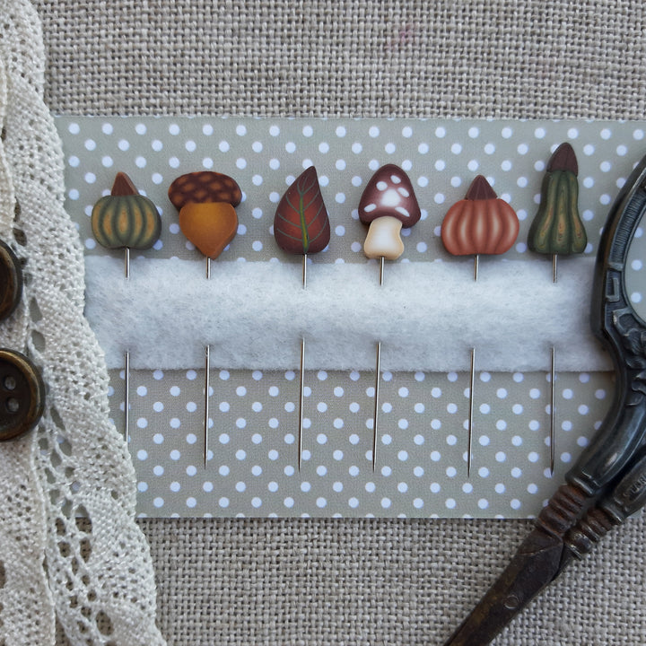 set of handmade ipns featurng pumpkins leaves and acorns 