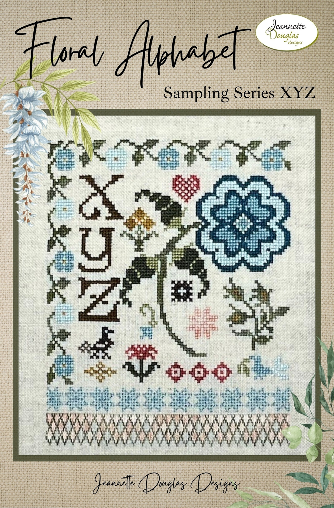 Floral alphabet sampler with letters and flowers, featuring Jeanette Douglas Designs branding.