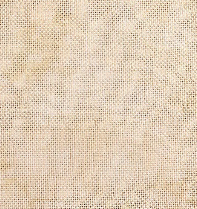 latte is a light cream color with subtle mottling of tank and brown hand dyed by fiber on a whim for cross stitch projects 