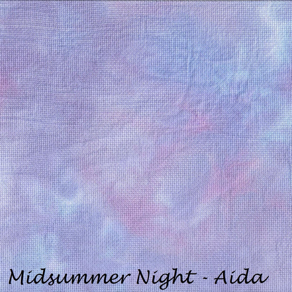A square fabric swatch with a mottled, tie-dye texture in pastel shades of lavender, light purple, and soft pink. The text 'Midsummer Night - Aida' is printed in black at the bottom.