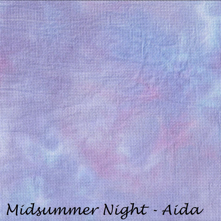 A square fabric swatch with a mottled, tie-dye texture in pastel shades of lavender, light purple, and soft pink. The text 'Midsummer Night - Aida' is printed in black at the bottom.