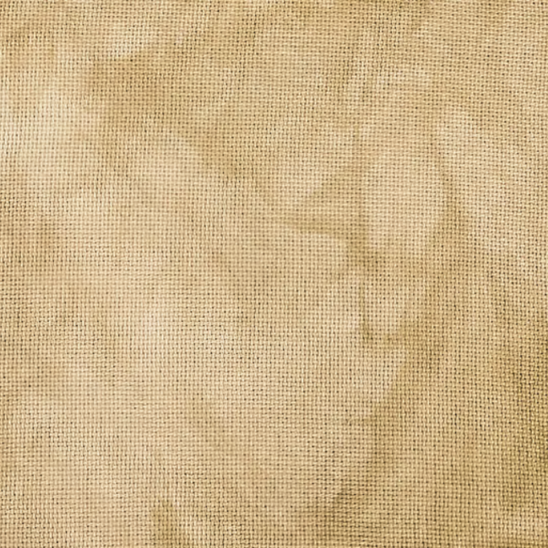 parchment aida is a rich tan color with green undertones fiber on a whim hand dyed cross stitch fabric 