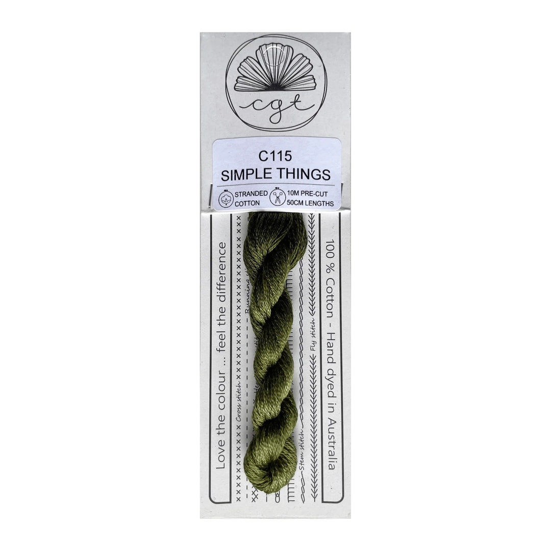 green skein of thread in cottage garden threads packaging on a white background