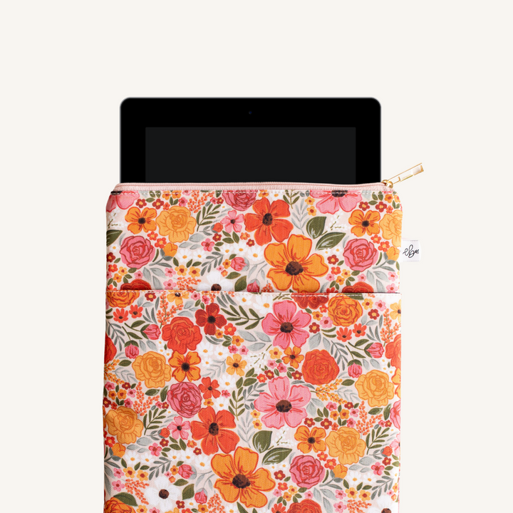 Floral patterned sleeve for a tablet on a white background