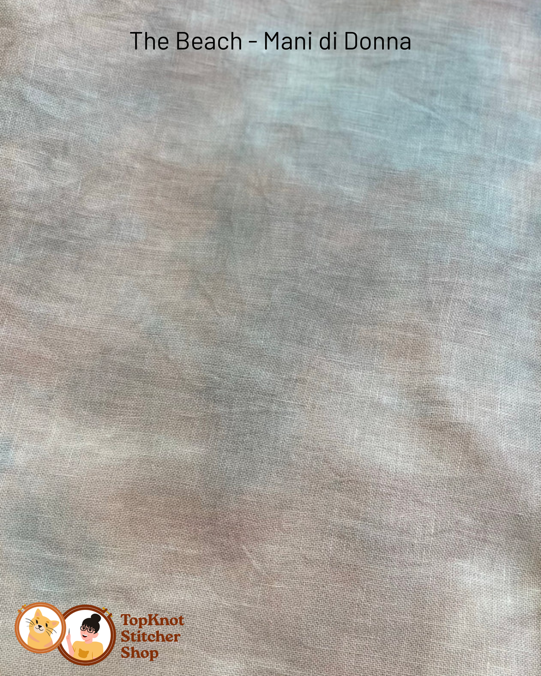 Textured light brown and blue grey fabric swatch with 'The Beach - Mani di Donna' branding and 'TopKnot Stitcher Shop' logo.