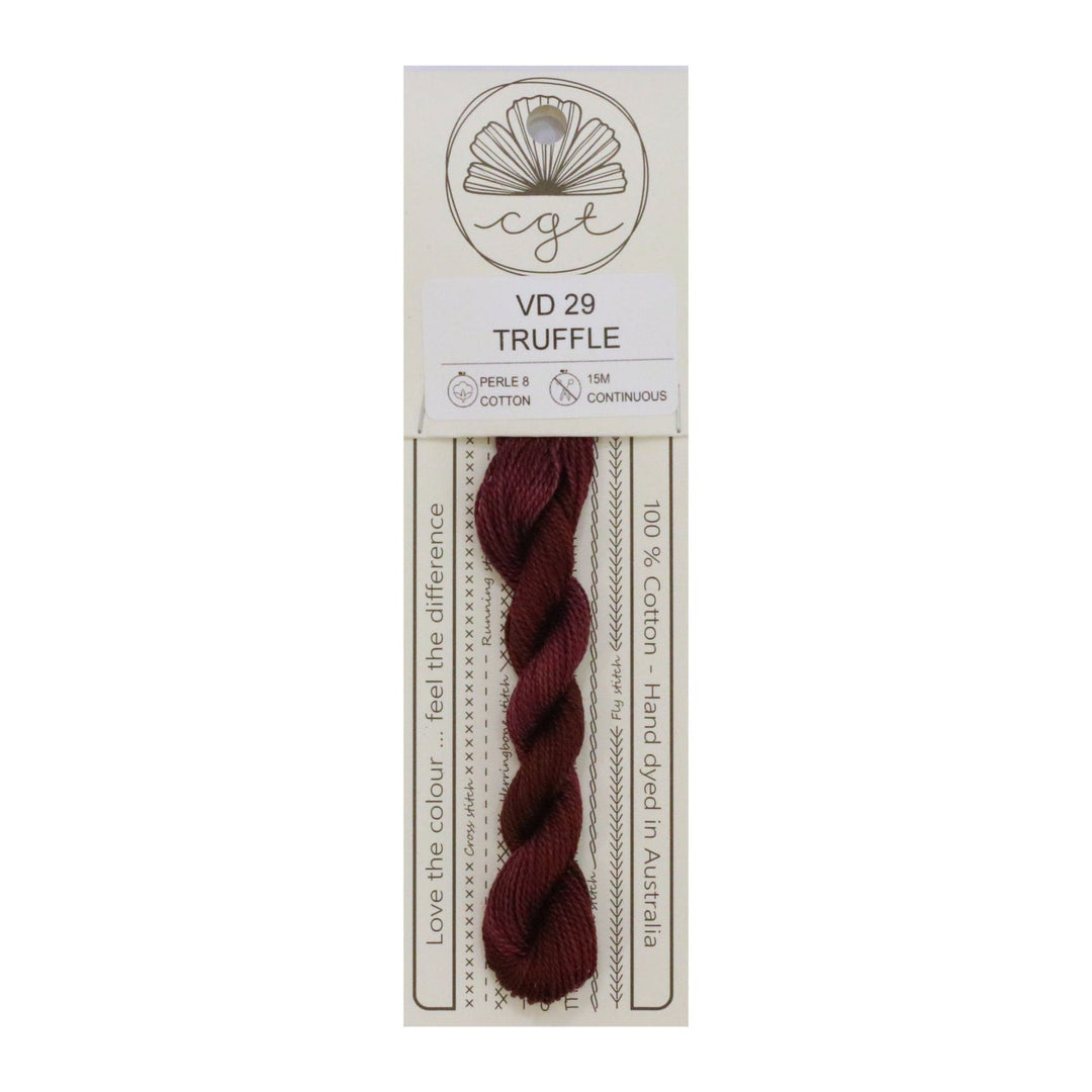 Packaged yarn with a truffle color on a white background