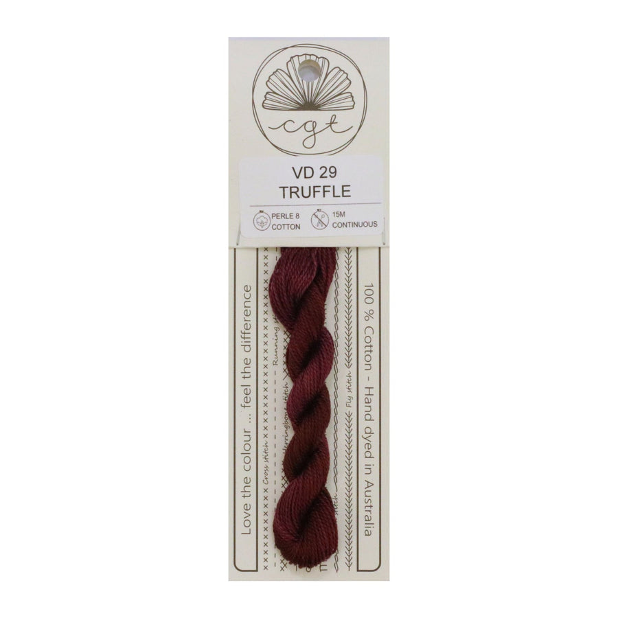Packaged yarn with a truffle color on a white background