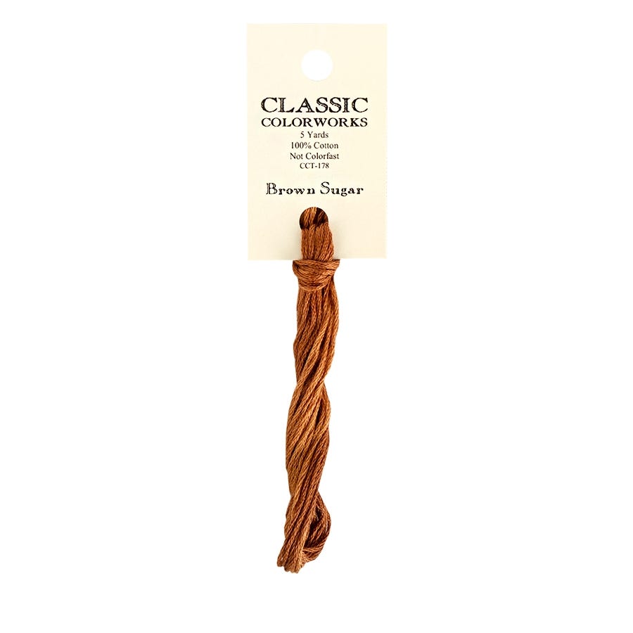 Brown yarn skein with a Classic Colorworks label on a white background