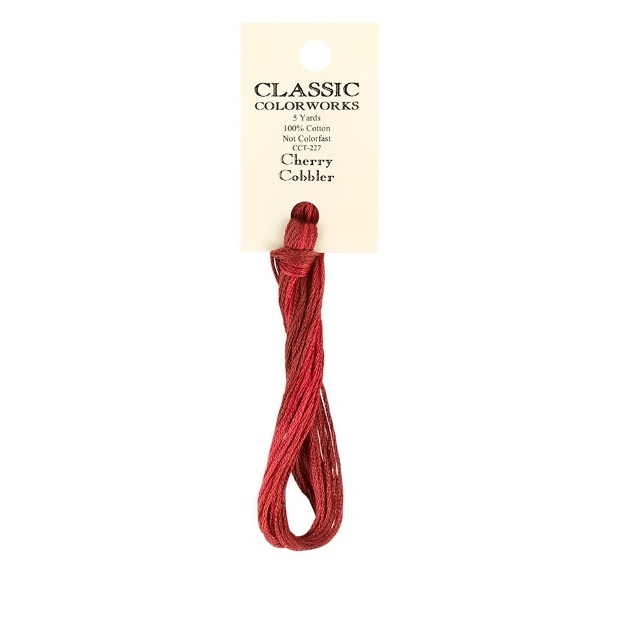 Red embroidery floss with a Classic Colorworks label on a white background