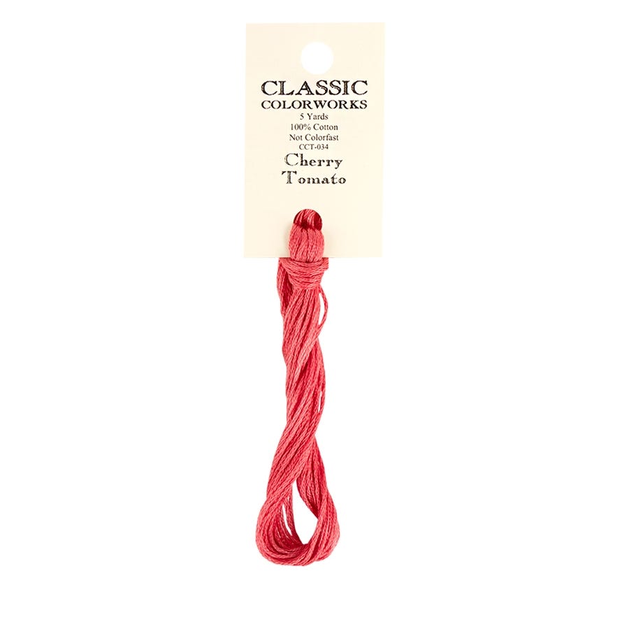 A skein of hand-dyed embroidery floss labeled 'Cherry Tomato' by Classic Colorworks, displayed on a card.