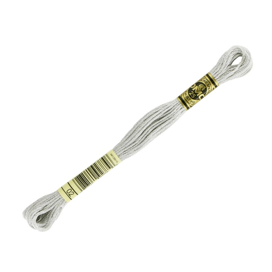 Thread spool with gold label on a white background