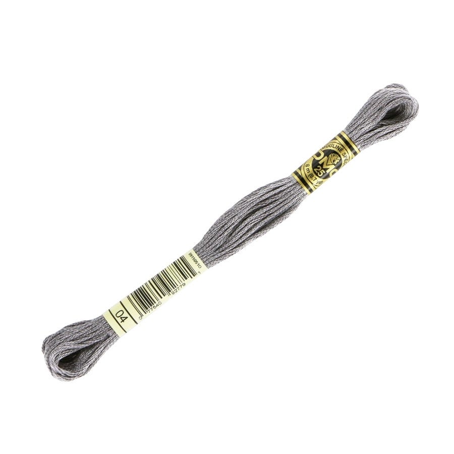 Gray embroidery floss with a gold label on a white background