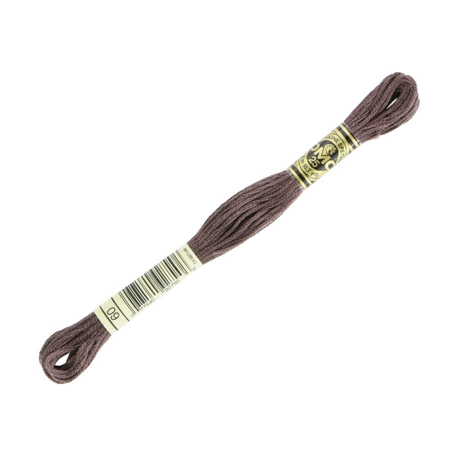 Brown embroidery floss with a label on a white background