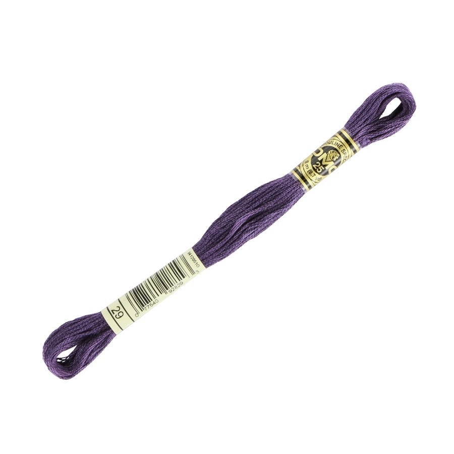 Purple embroidery floss with a label on a white background