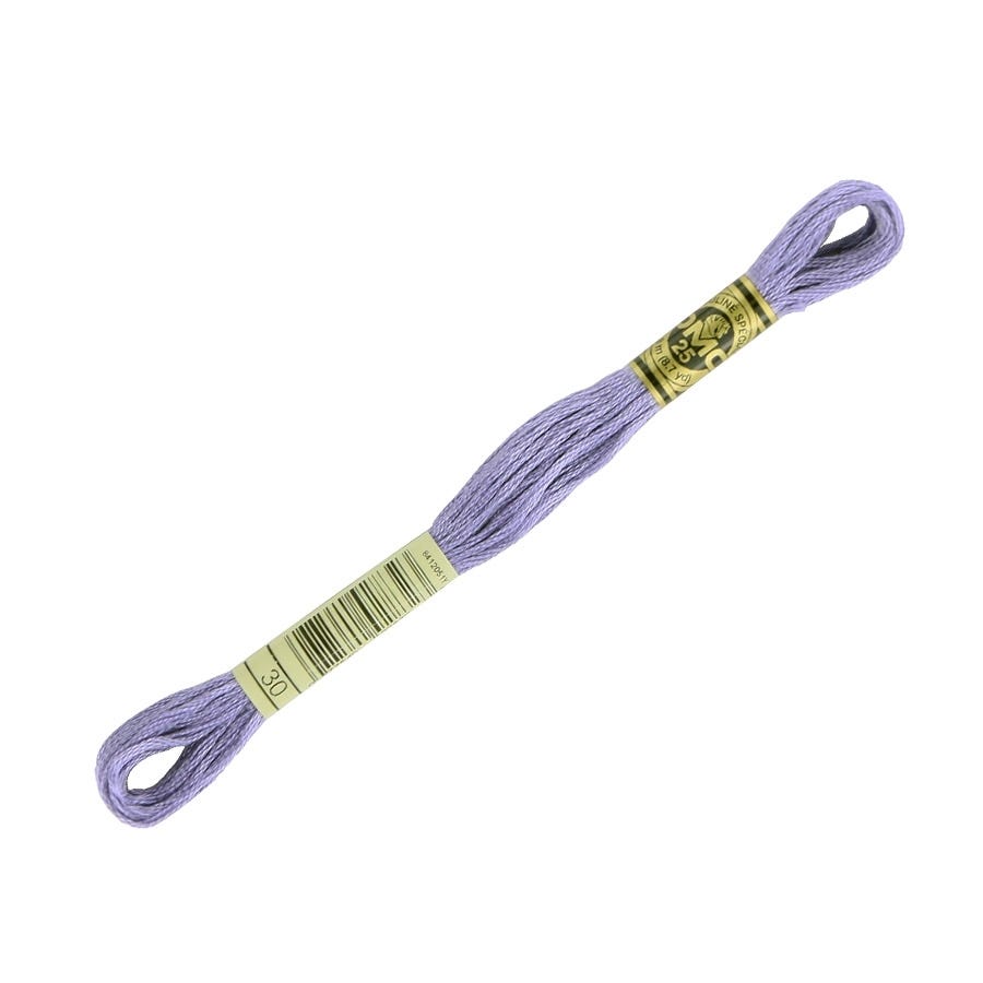 Spool of purple embroidery floss with a label on a white background