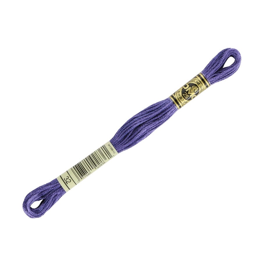 Purple embroidery floss with a label on a white background