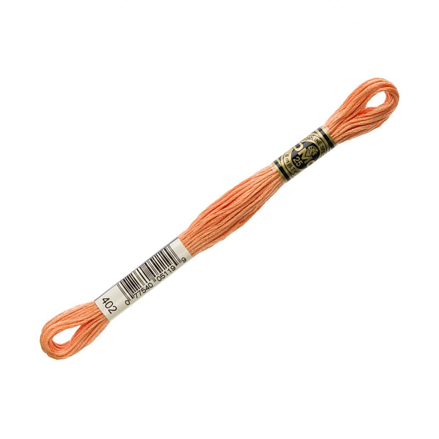 Peach-colored embroidery floss with a label on a white background