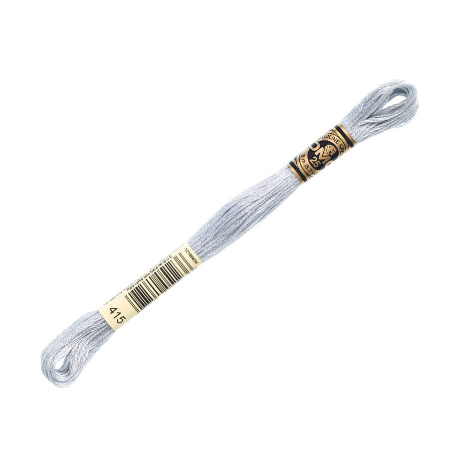 Embroidery floss spool with a label on a white background