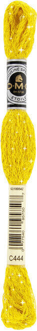 Yellow embroidery floss spool with a label on a white background