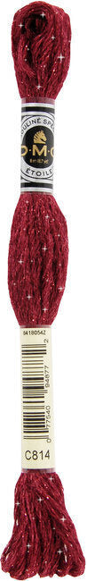 Red embroidery floss with a label on a white background