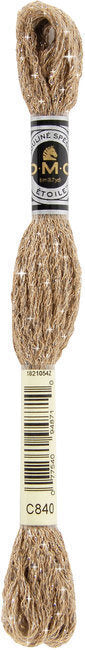 DMC embroidery floss spool in beige color with label