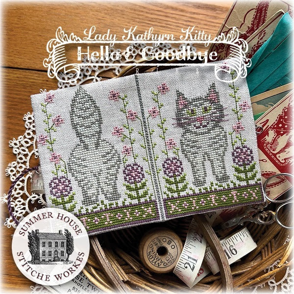 Embroidery kit with cat design surrounded by sewing tools and materials, featuring 'Lady Kathryn Kitty' branding.