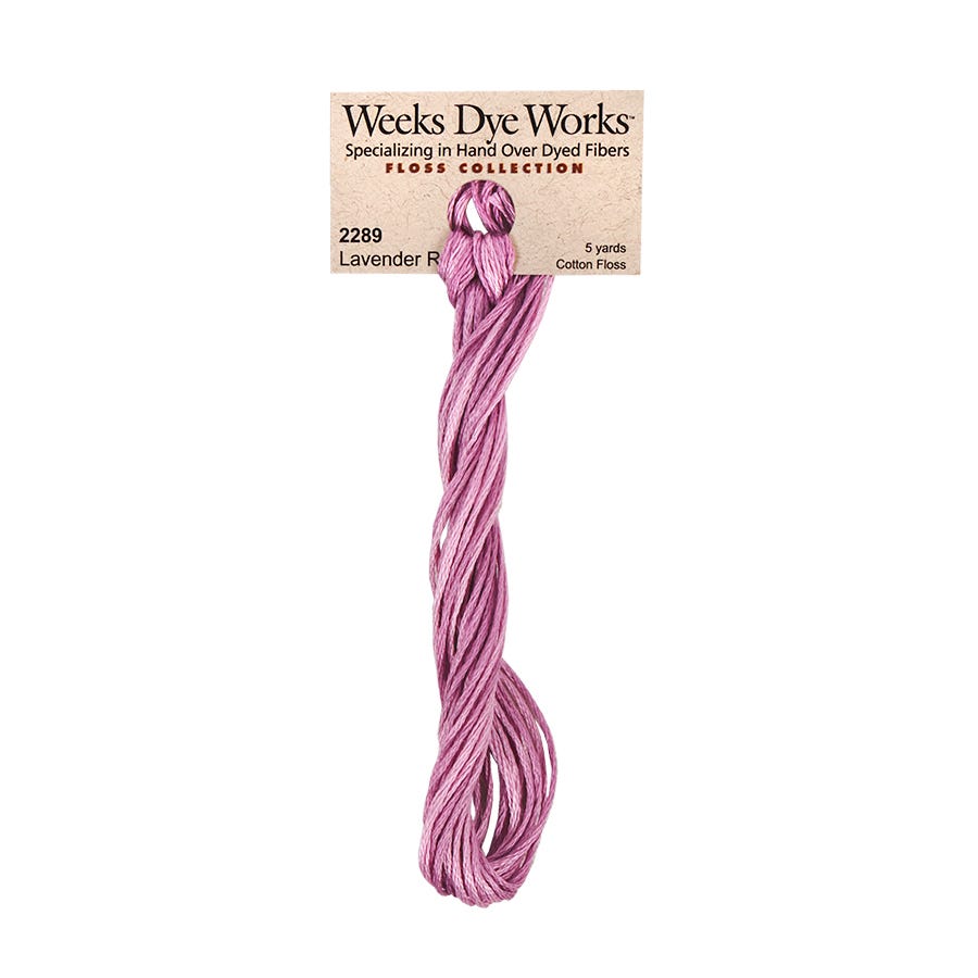 Pink thread skein with Weeks Dye Works label on a white background