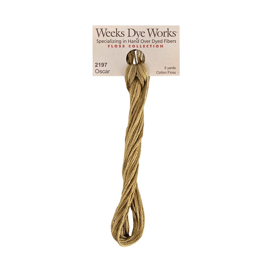 A skein of Weeks Dye Works hand-dyed embroidery floss in a beige color, with the brand's label showing the color name and code '2197 Oscar'.