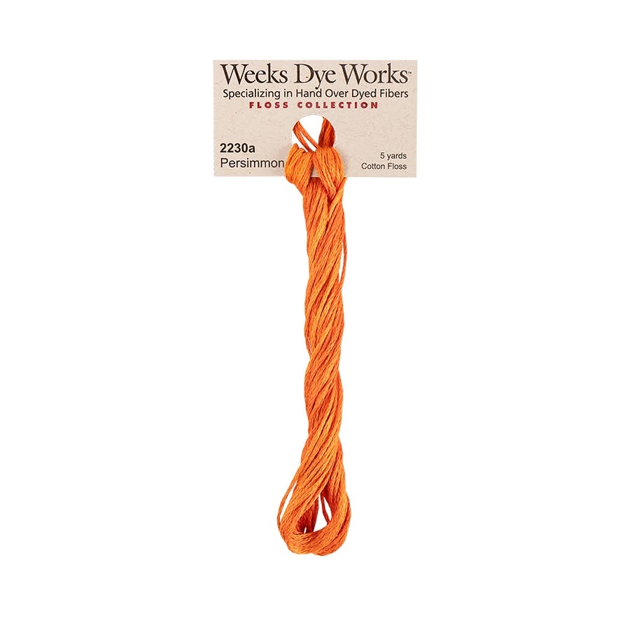 Orange floss with Weeks Dye Works label on a white background