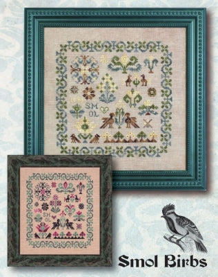 Two framed needlepoint samplers, one with a floral pattern and the other with a bird-themed design, both in a spring color palette.