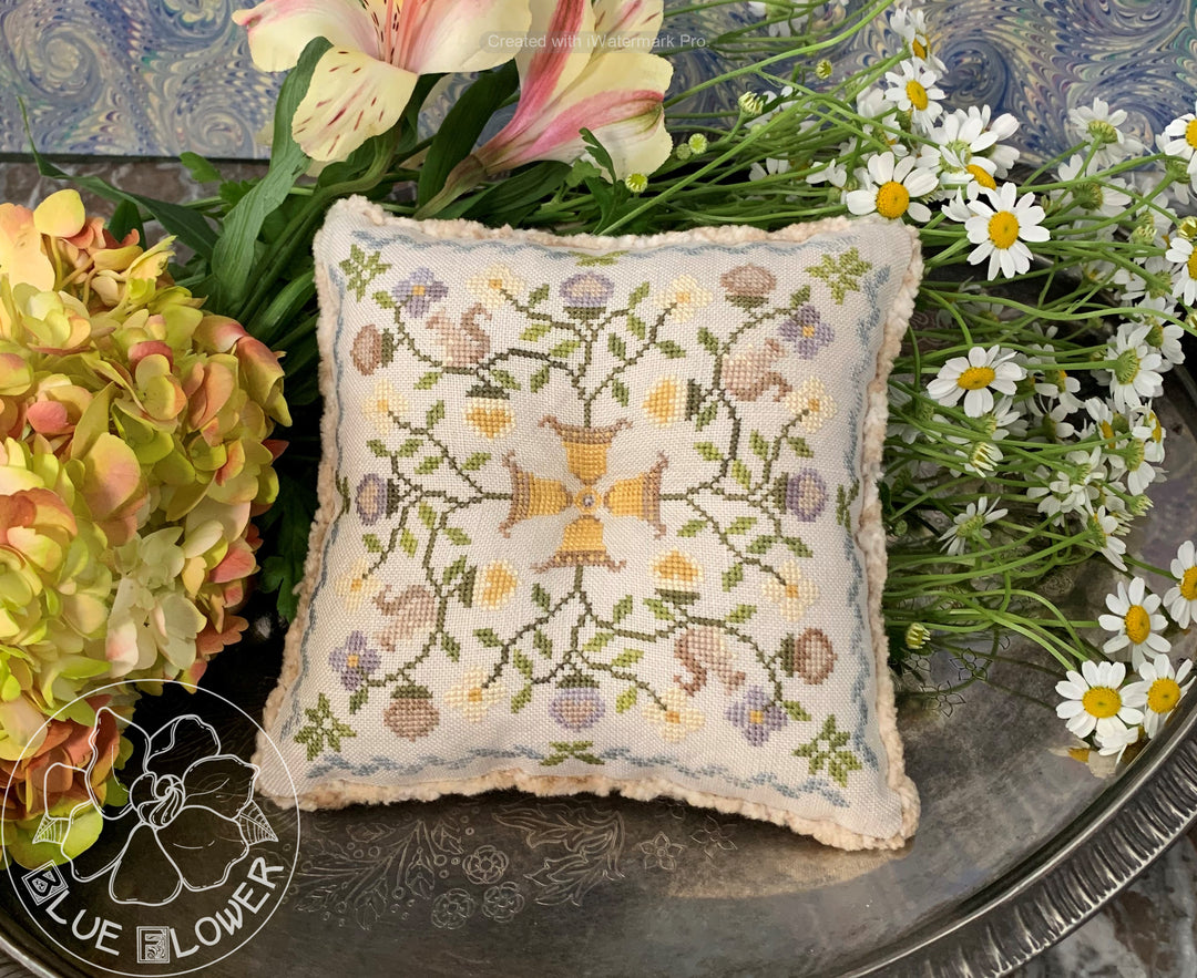 small pincushion with acorns and flowers 