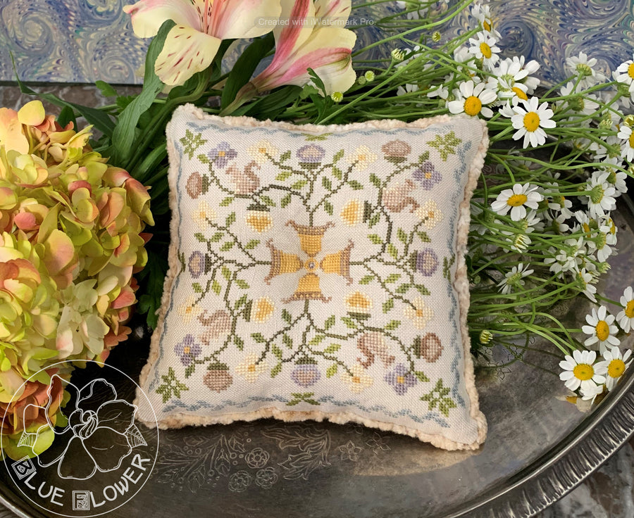 small pincushion with acorns and flowers 