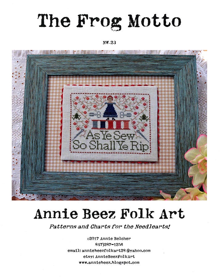 A needlepoint artwork with a green border featuring a frog motif, labeled as 'Annie Beez Folk Art' and 'Patterns and Charts for the Needleheart'.