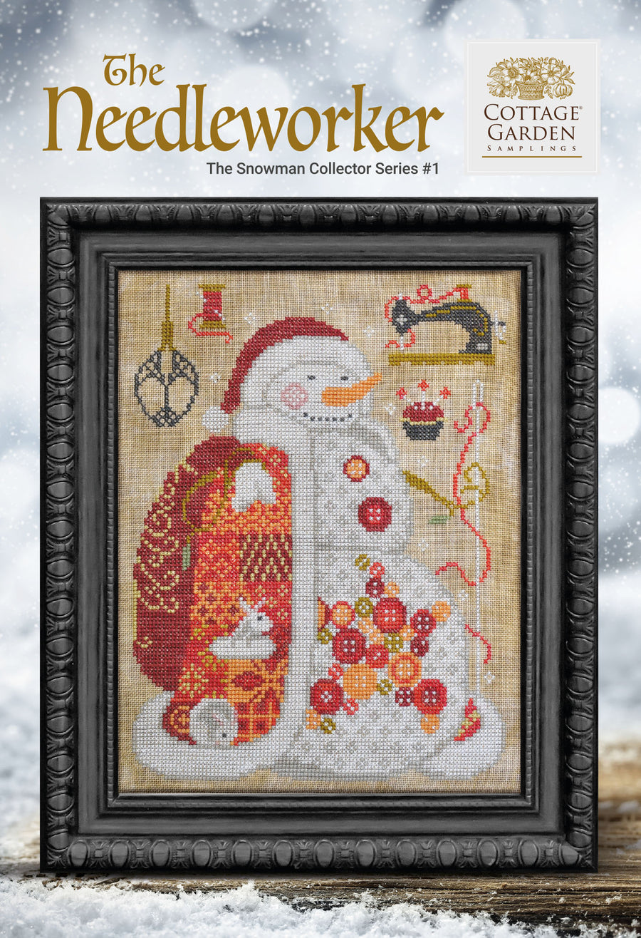 Cross-stitched snowman design in a decorative frame with 'The Needleworker' branding.