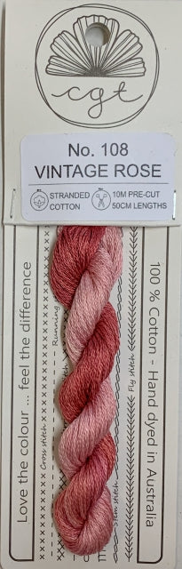 A card with a spool of hand-dyed, 100% cotton cross stitch and embroidery floss in shades of vintage rose color.