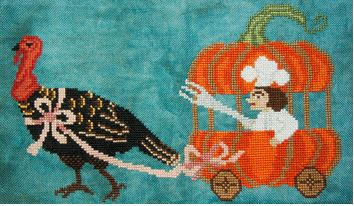 Cross-stitched design of a turkey pulling a pumpkin-shaped wagon with a person inside on a blue background.